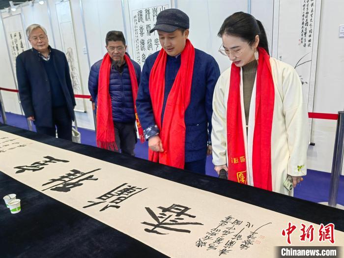 第二届中国春兰节举行 “兰花百咏”书画印展“绚丽绽放”